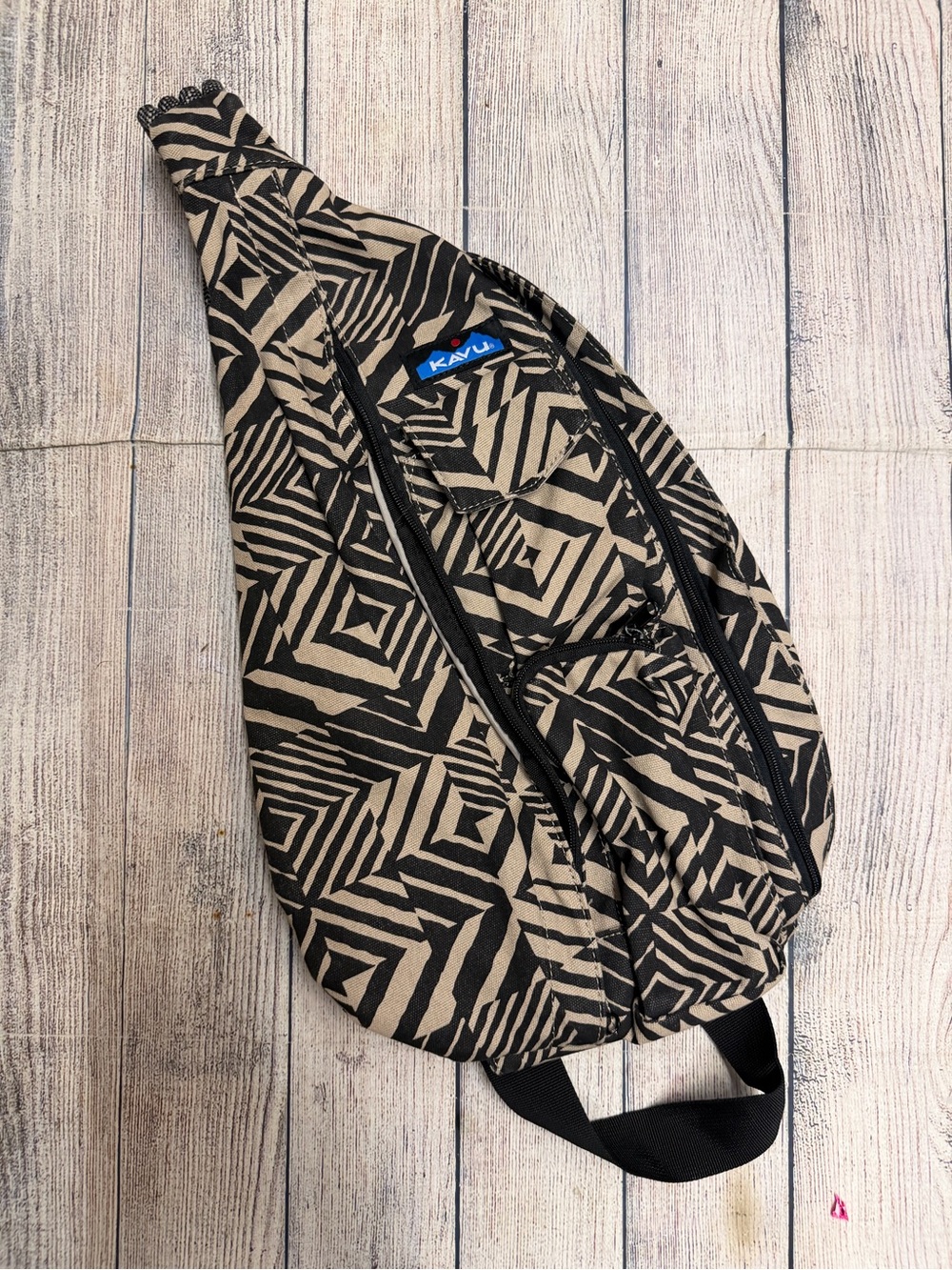 Kavu womans Tan & Black Sling Bag - Geo Print